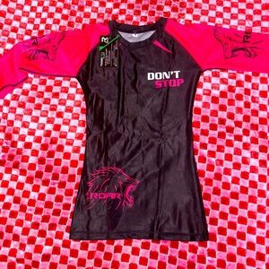 Women’s Brazilian Jujitsu Shirt. It’s a size S but is smaller, so like a XS. New